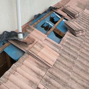 Roof Repairs Brisbane On Tan Coloured Tiles