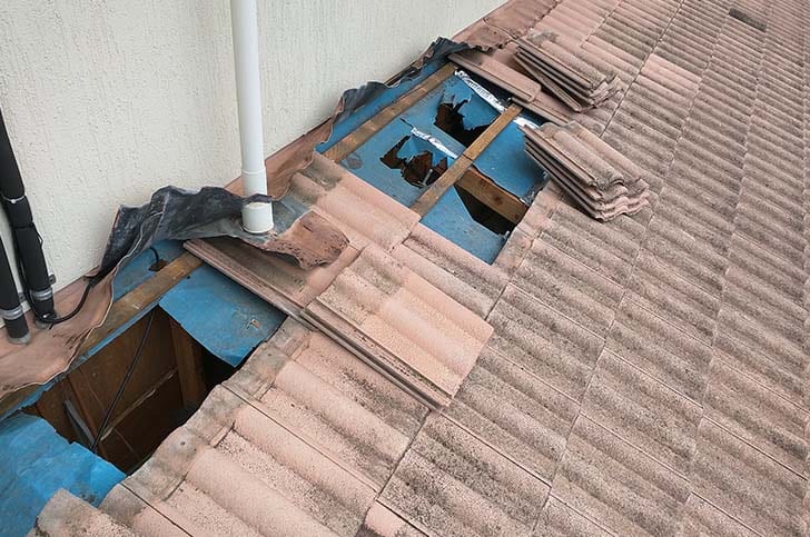 Roof Repairs Brisbane On Tan Coloured Tiles